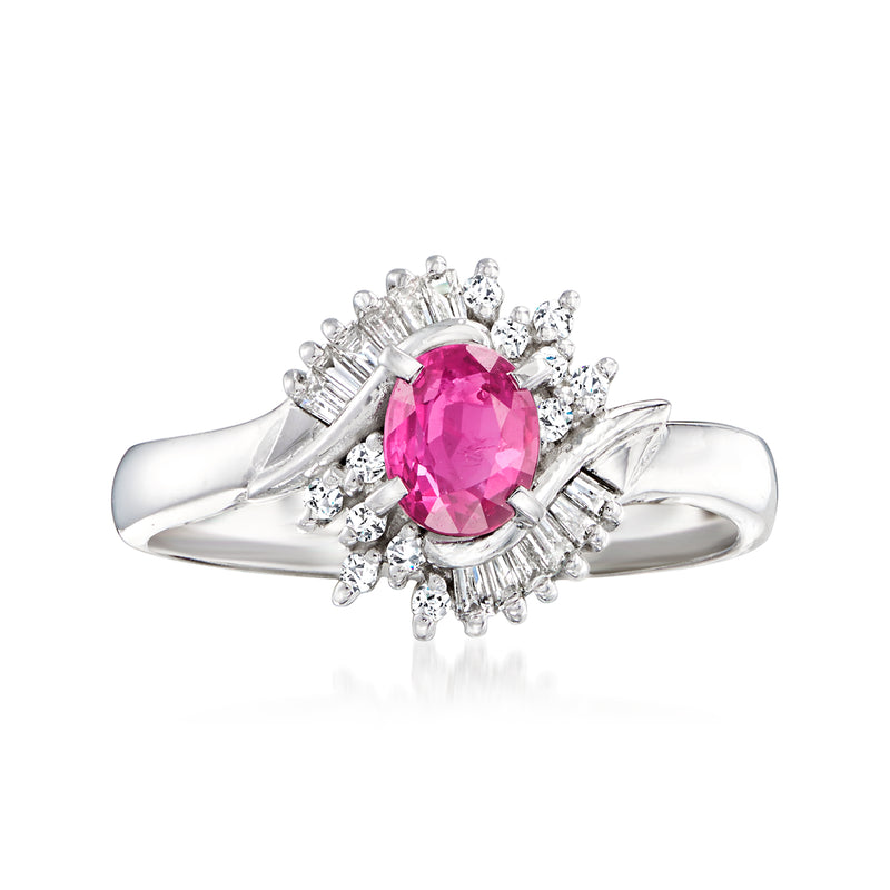 Vintage platinum ring with pink oval ruby and diamond halo, prong-set