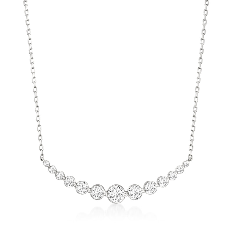 Diamond curved bar necklace in white gold with graduating round stones