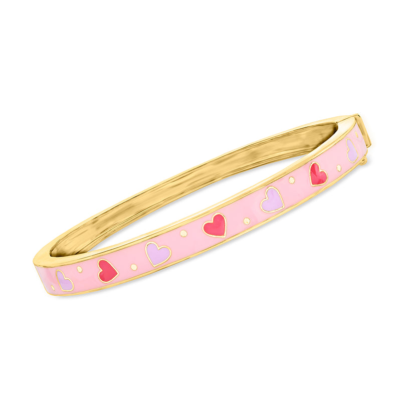 Gold bangle bracelet with pink enamel bar and red heart accents