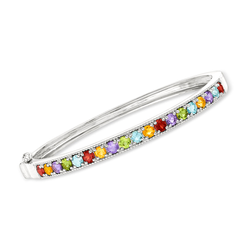 Sterling silver bangle bracelet with multi-color gemstone row along the front