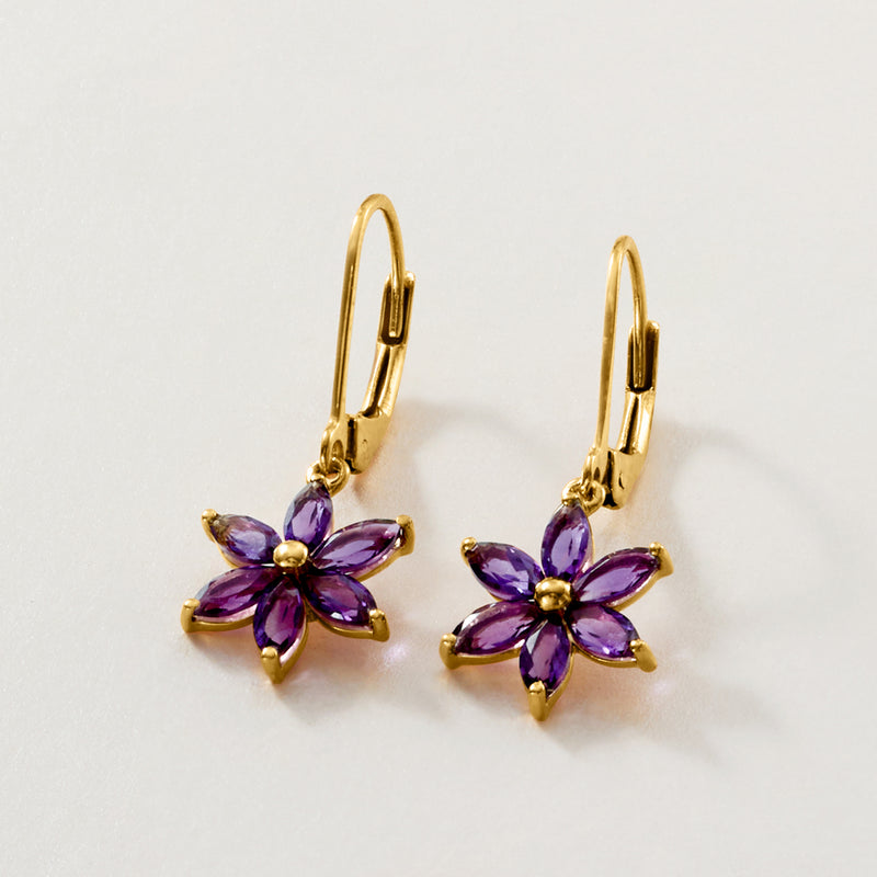 Gold-tone leverback earrings with a purple amethyst flower drop and gold center bead.