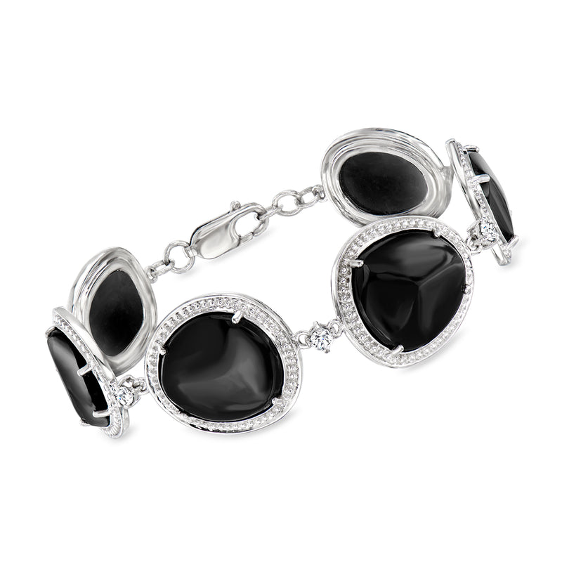 Sterling silver bracelet with oval black stones and round halo accents