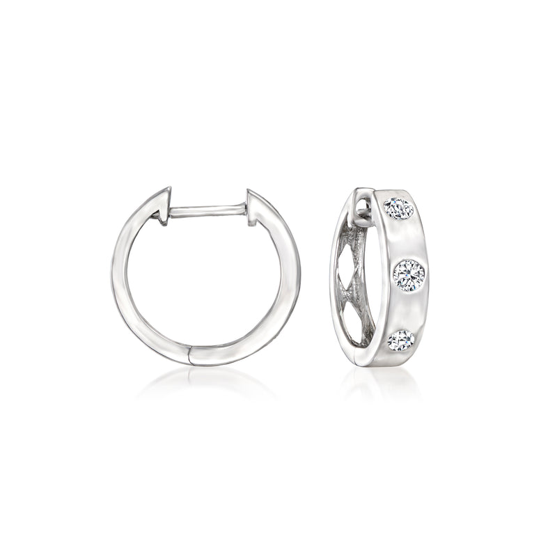 Sterling silver huggie hoop earrings with small round diamond accents