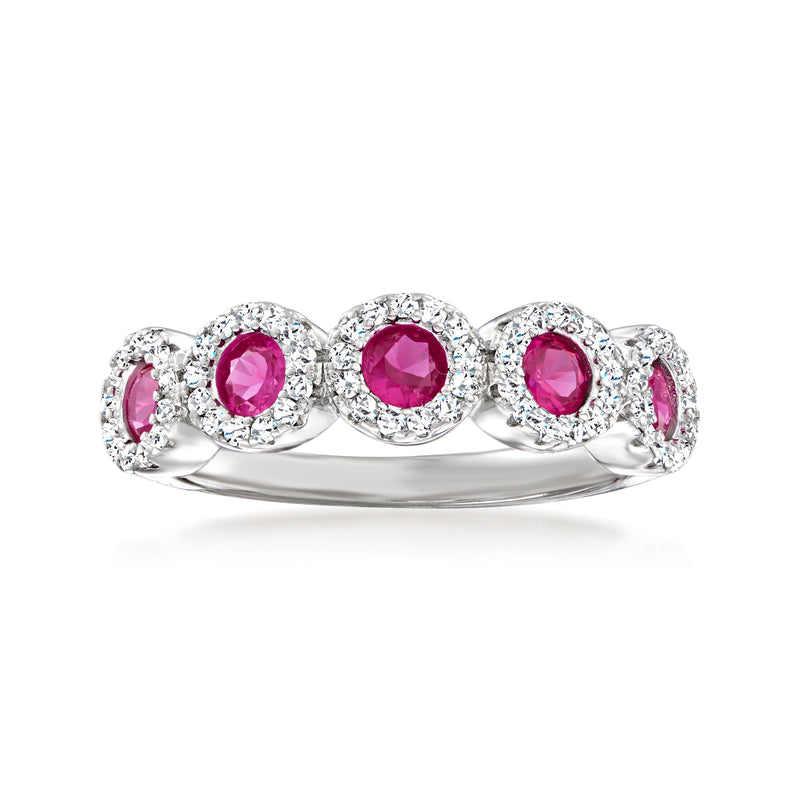 Sterling silver ring with pink simulated ruby stones and CZ halo accents