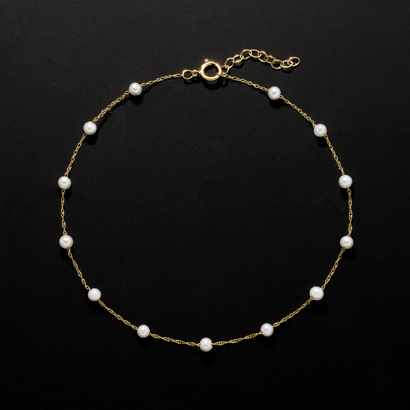 Cultured pearl station anklet in 10kt yellow gold with round white pearls and clasp