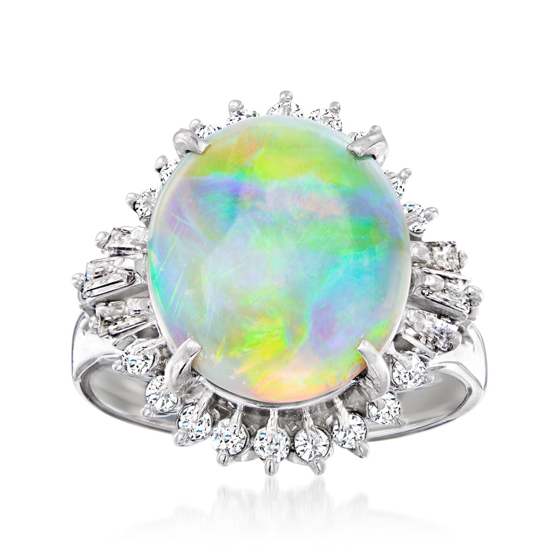 Platinum opal ring with large round opal center and halo of diamonds
