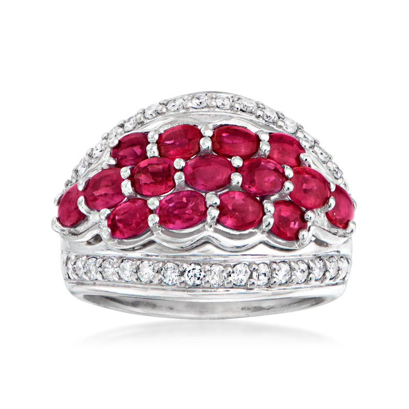 Vintage dome ring with oval pink gemstones and round clear diamonds in silver-toned setting