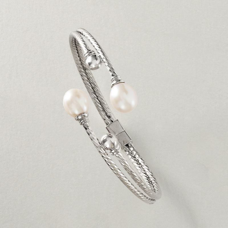 Sterling silver braided cuff bracelet with cultured white pearls and secure clasp