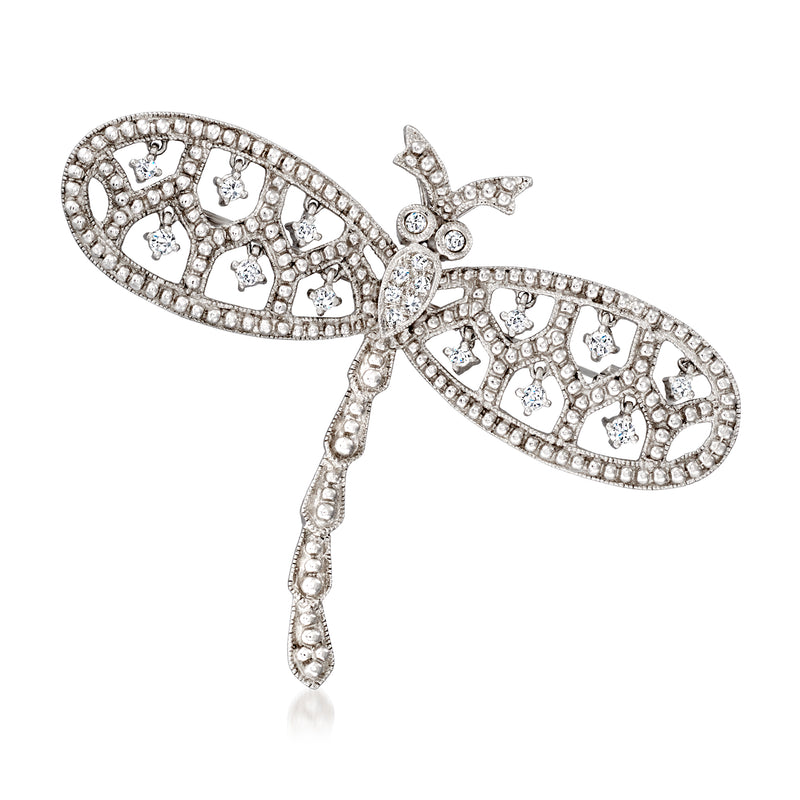 White gold diamond dragonfly pin with detailed wings and dangling tail accents