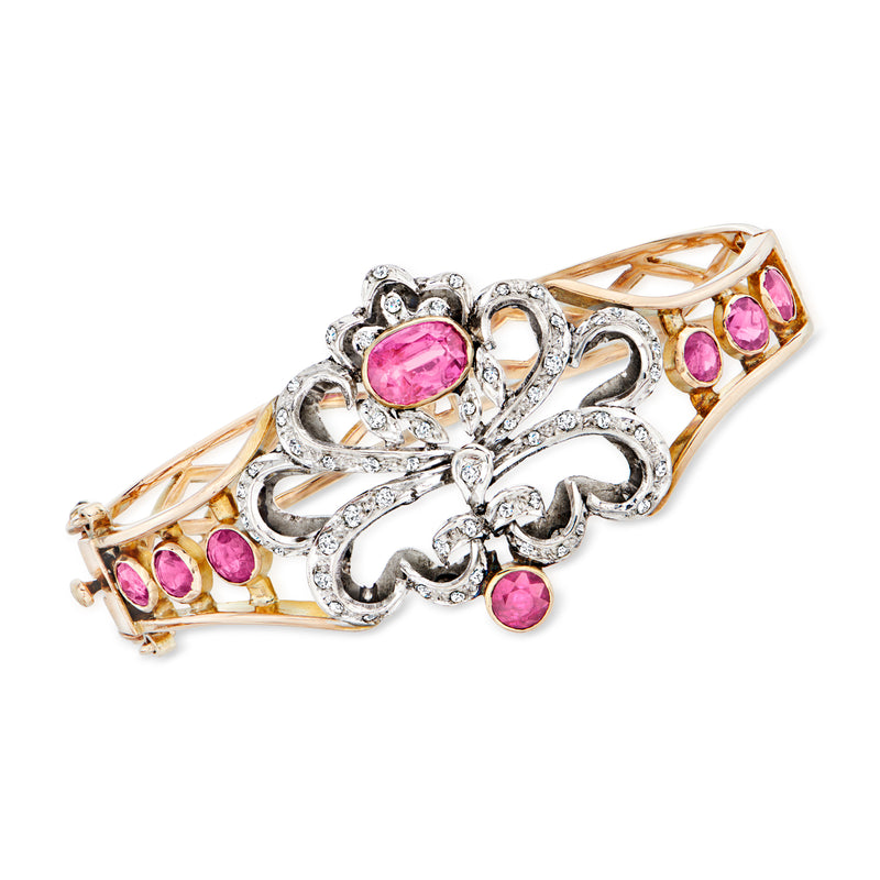 Two-tone 14kt gold floral bangle bracelet with pink ruby and diamond accents
