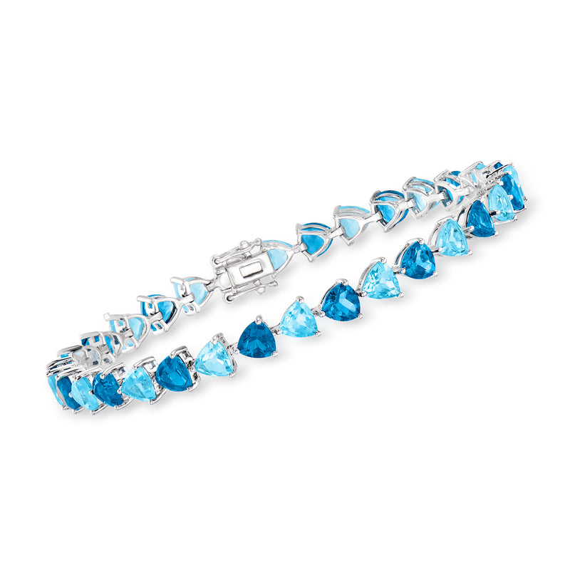 Sterling silver tennis bracelet with blue topaz stones and box clasp