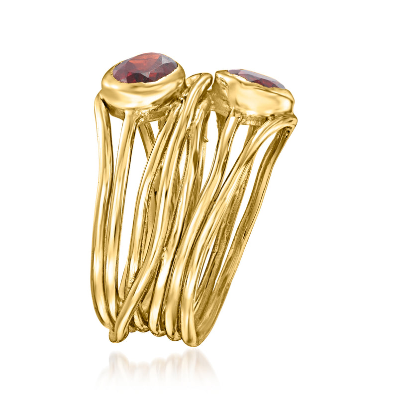 Gold over sterling garnet highway ring with two oval red stones in prong settings