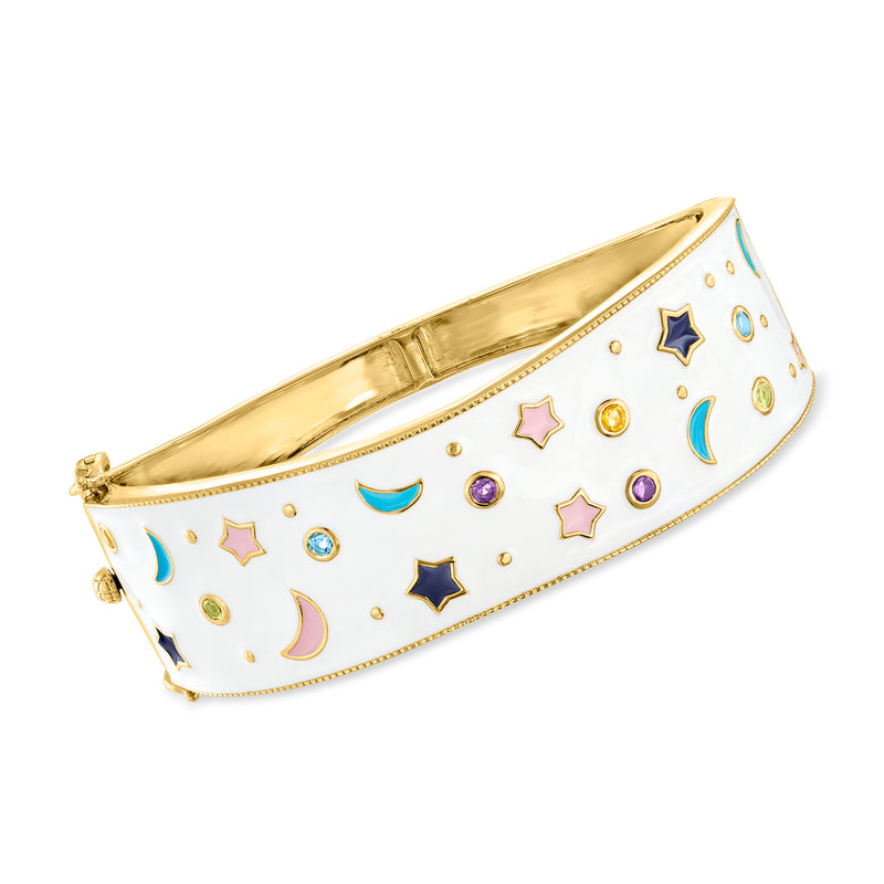 Celestial bangle bracelet with white enamel and multicolor star moon designs, gold-tone