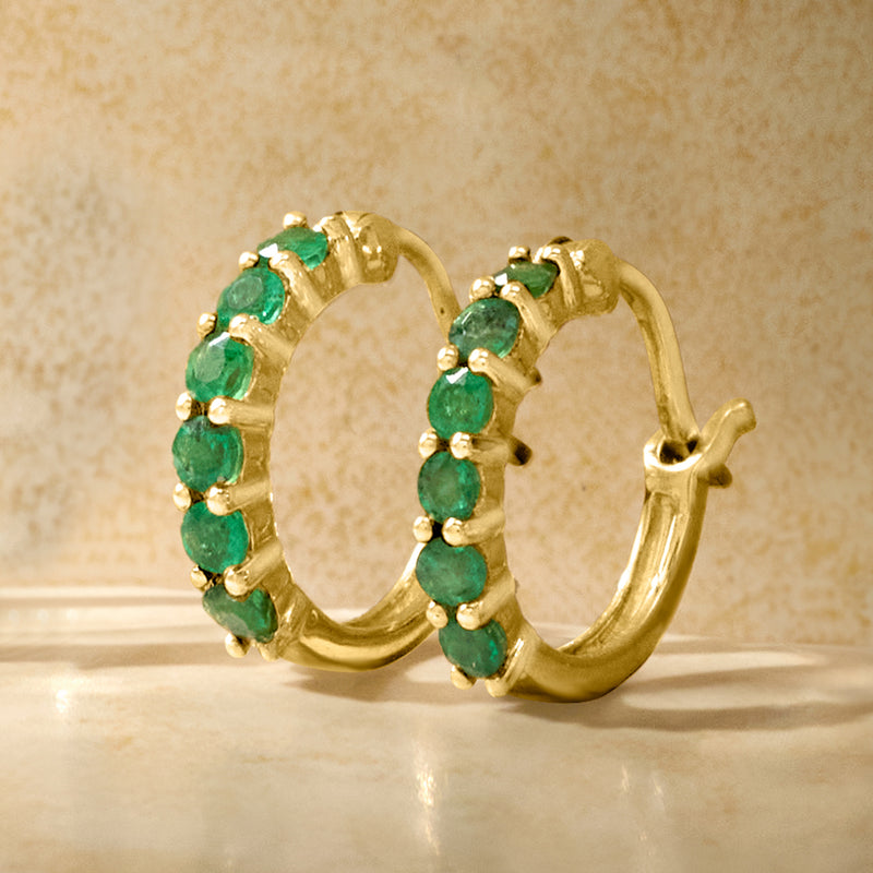 14kt yellow gold huggie hoop earrings with stacked emerald-green stones