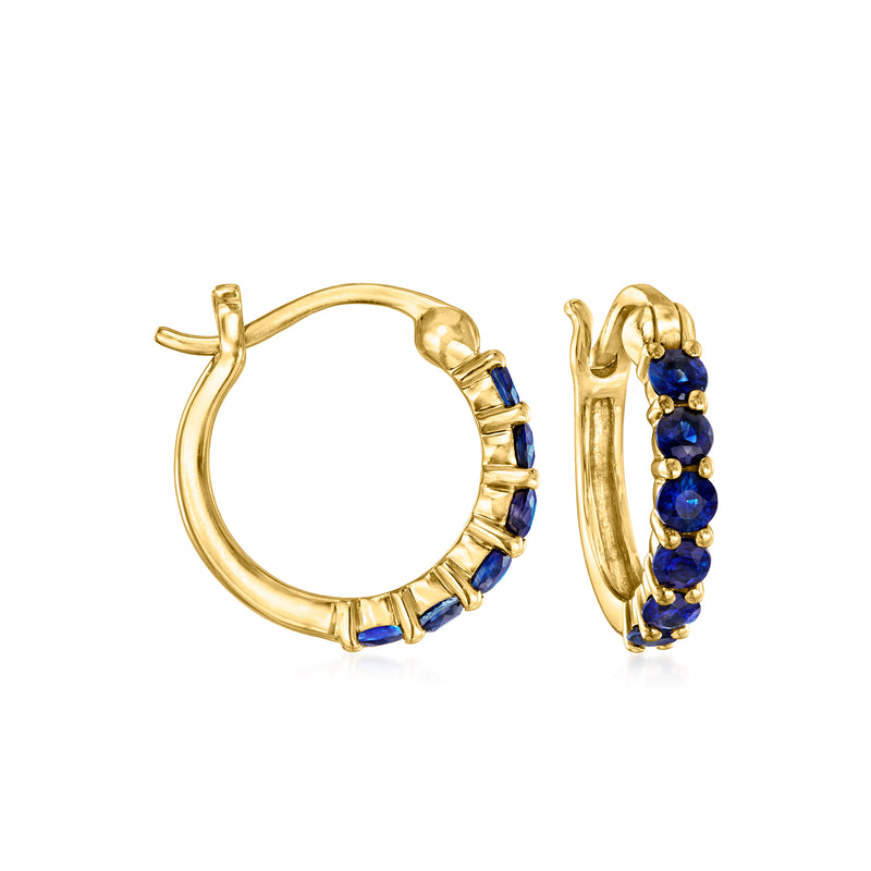 14kt yellow gold huggie hoop earrings with blue sapphire stones