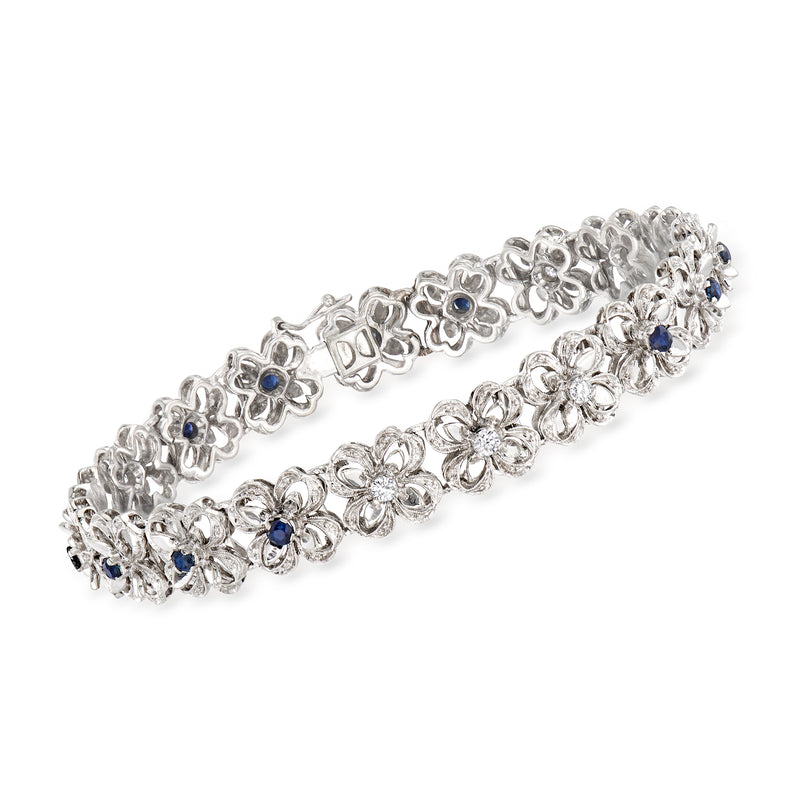18kt white gold flower bracelet with blue sapphire and diamond accents, linked design