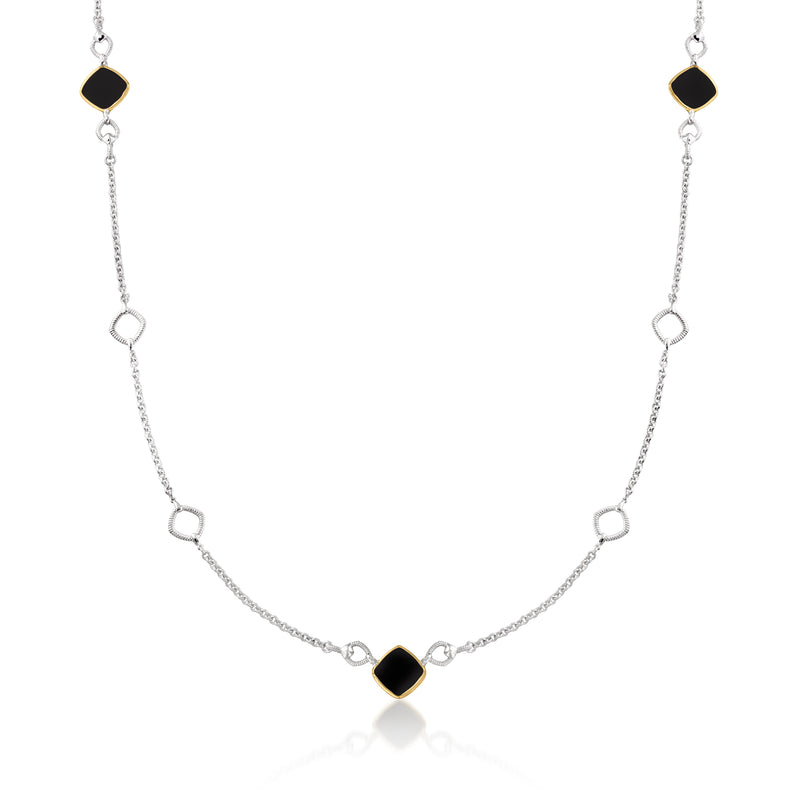 Sterling silver station necklace with black onyx oval links and 18kt yellow gold accents