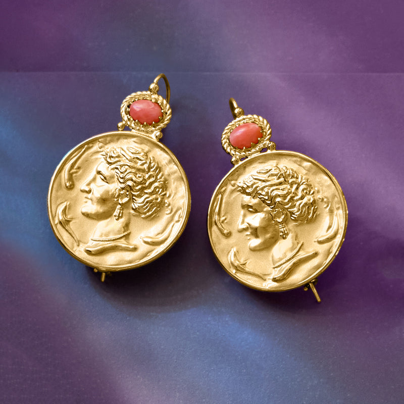 Gold drop earrings showing two Roman portrait coin medallions with pink coral cabochons