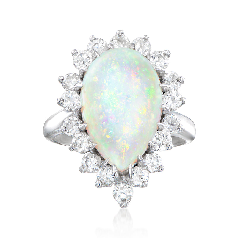 14kt white gold oval opal center with diamond halo dinner ring