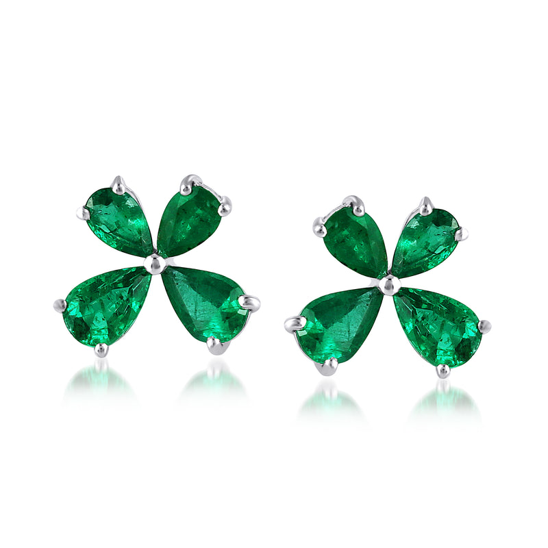 Emerald floral stud earrings in 18kt white gold, four green gemstone petals with posts