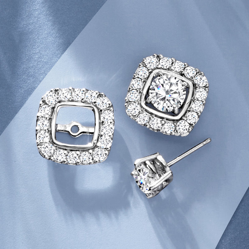 Pair of white gold diamond earring jackets with square halo, shown with posts