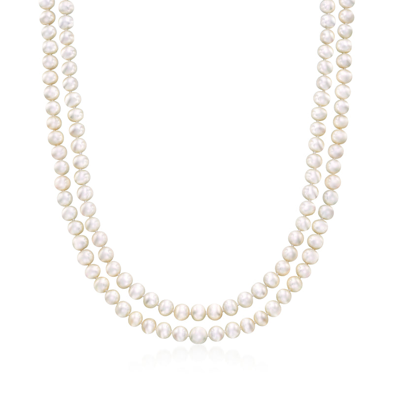 Two-strand cultured pearl necklace with round white pearls, braided drape