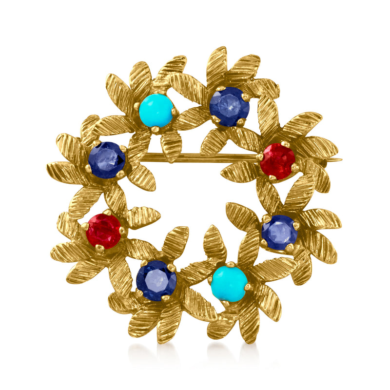 18kt yellow gold wreath pin with turquoise, sapphire-blue, and ruby-red gemstones