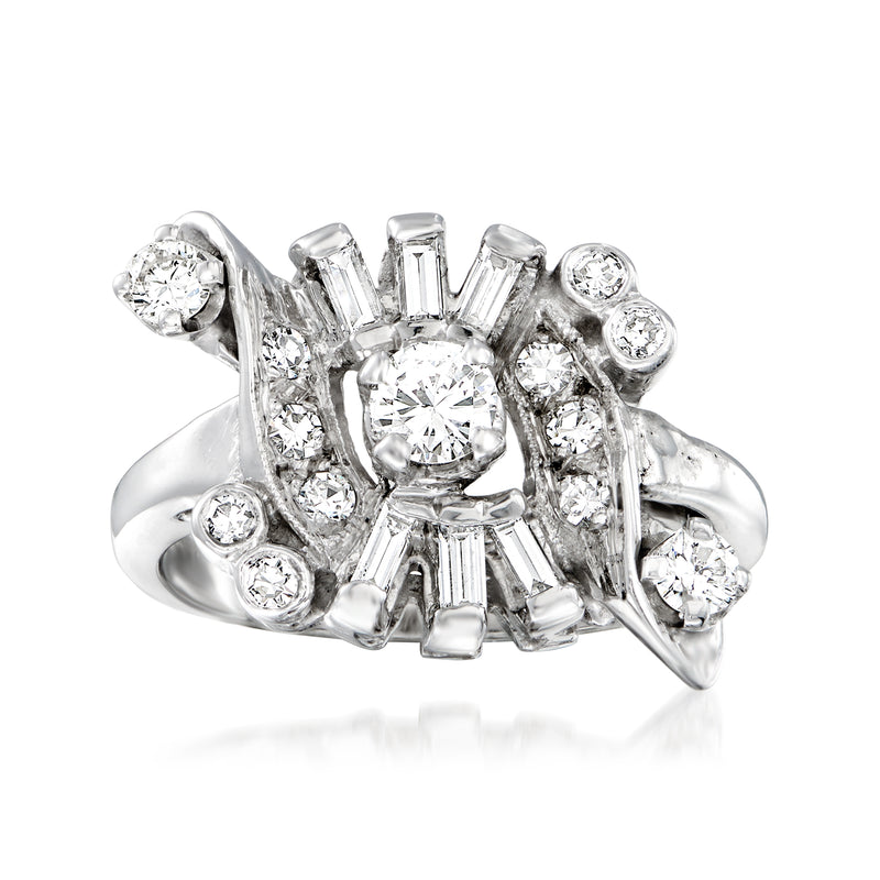 Vintage 14kt white gold diamond ring with round center and baguette side accents