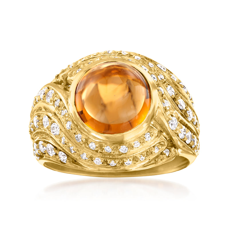 18k yellow gold citrine cabochon ring with round diamond halo and swirl setting