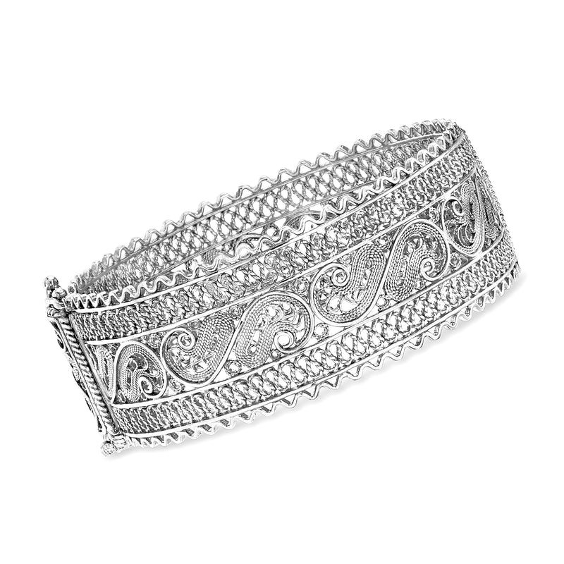 Sterling silver filigree bangle bracelet with ornate etched patterns and lattice border