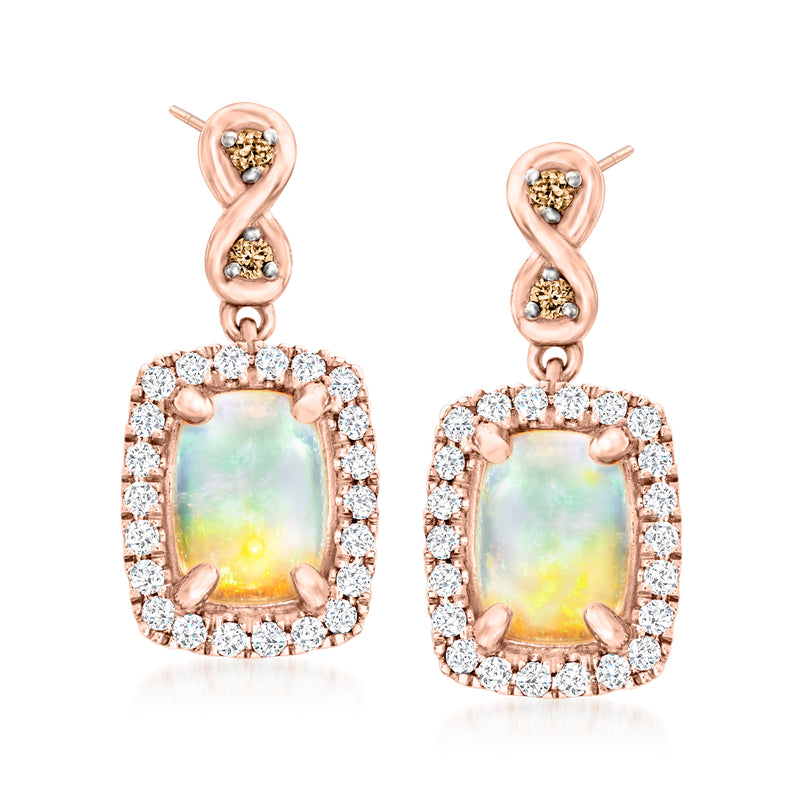 Rose gold opal drop earrings with oval halo of clear diamond-like stones