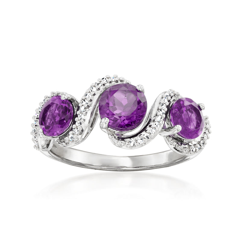 Sterling silver swirl ring with three purple amethyst gemstones and diamond accents