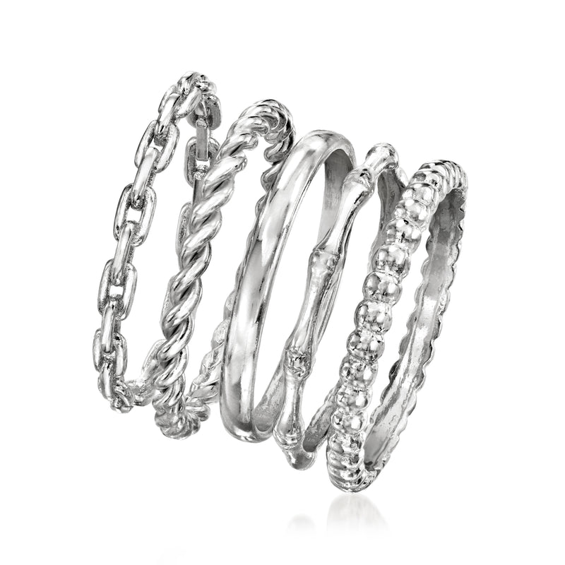 Stackable sterling silver rings with smooth, twisted, and bead-texture bands