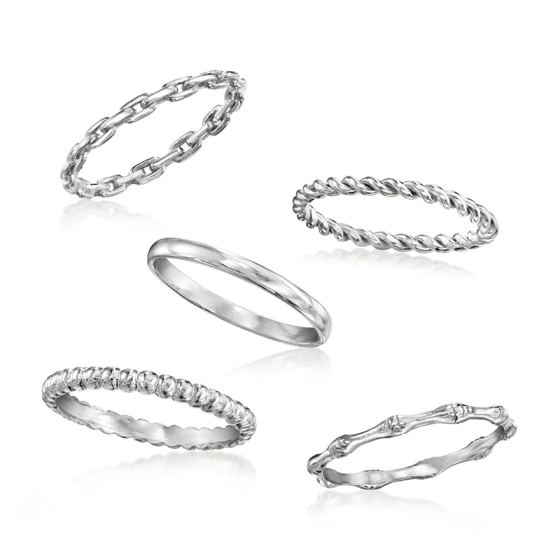 Five sterling silver stackable rings, mixed textures including rope and smooth
