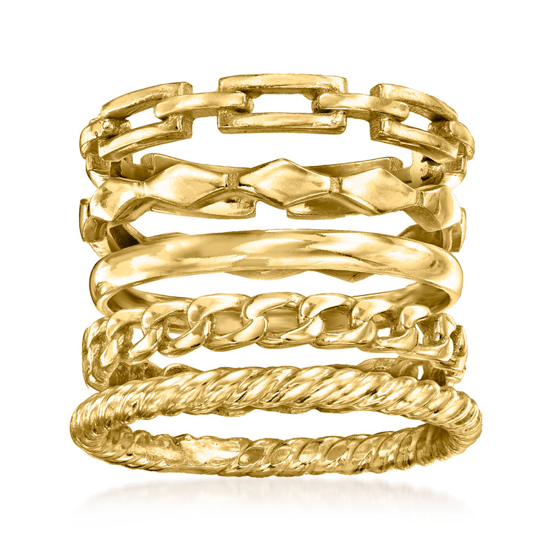 Gold-tone stackable ring set with five textured bands in a layered look.