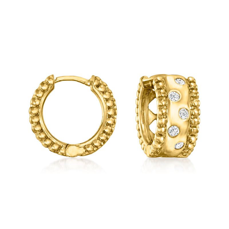 Gold hoop earrings with beaded edge and three round diamond accents