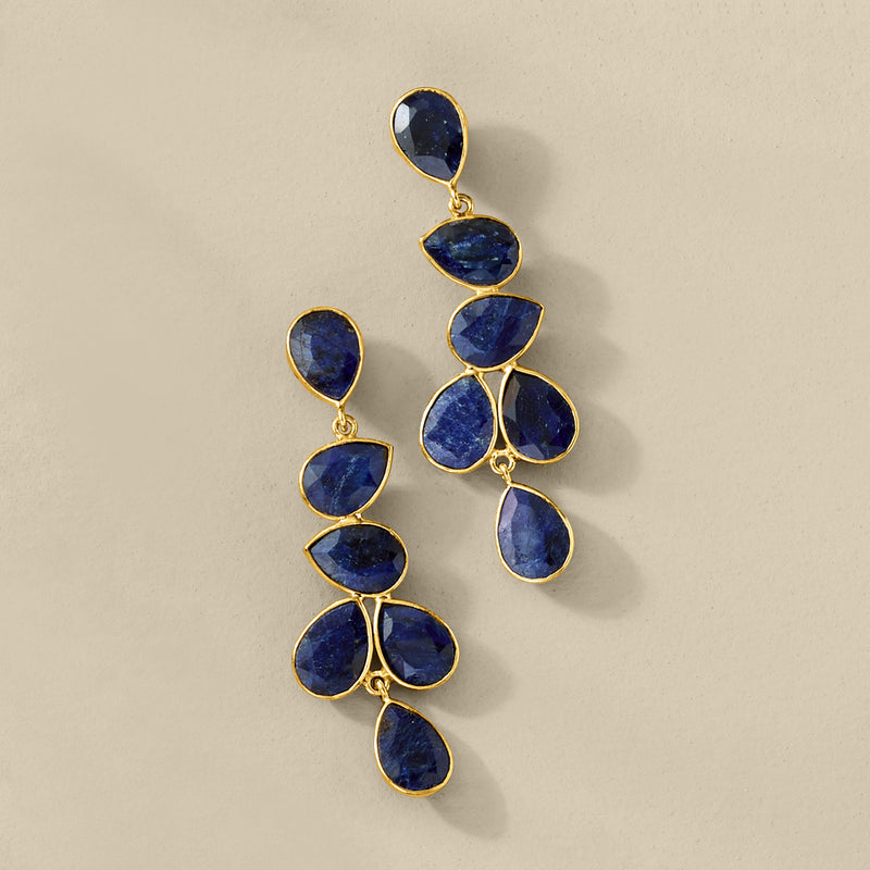Gold-tone drop earrings with dark blue teardrop sapphires in clustered, multi-drop design