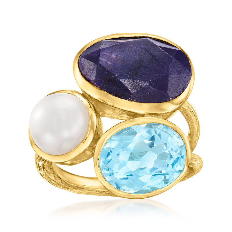 18kt gold ring with purple oval sapphire, blue oval topaz, and white cultured pearl