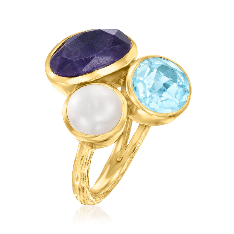 18kt gold ring with oval purple sapphire, oval sky-blue topaz, and white cultured pearl