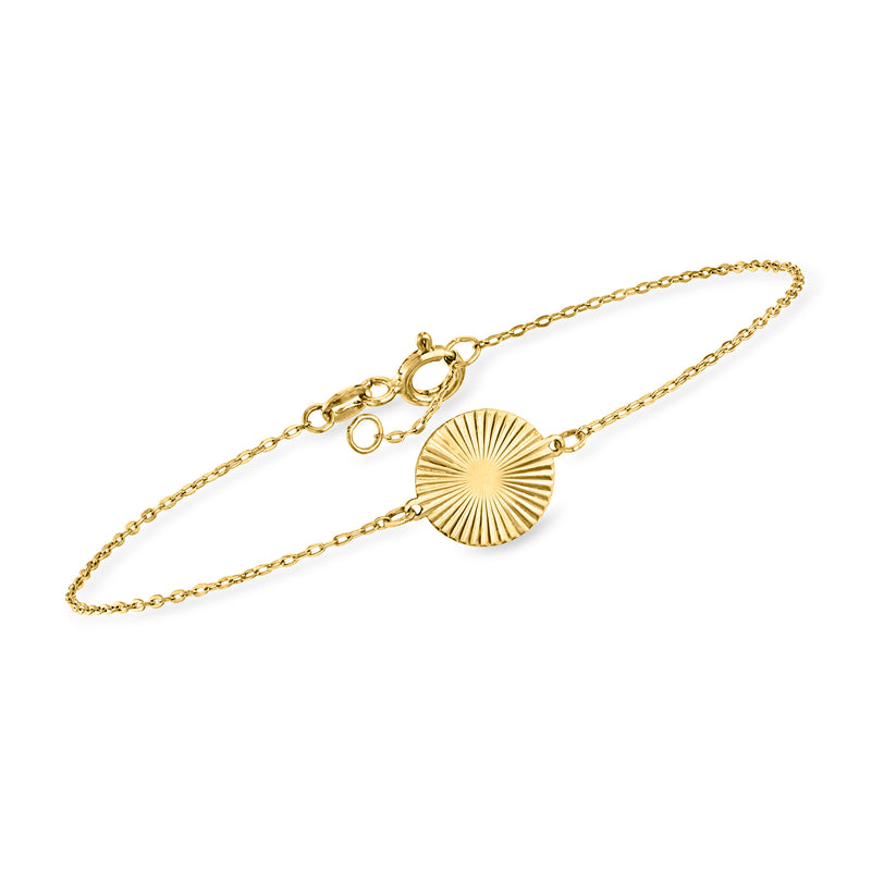 14kt yellow gold starburst circle bracelet with round textured pendant and chain clasp