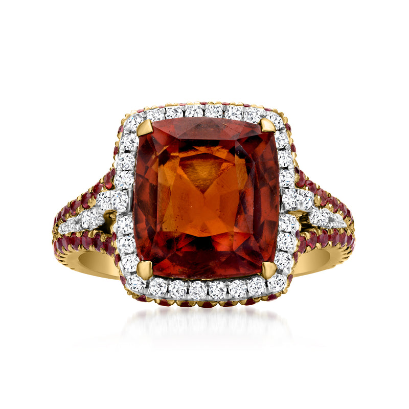 18kt yellow gold ring with large cushion-cut orange hessonite, diamond halo and pave shoulders