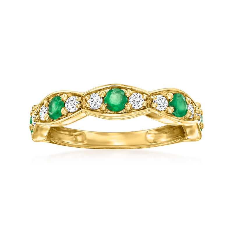 14kt yellow gold ring with oval emerald green center and small white diamond accents