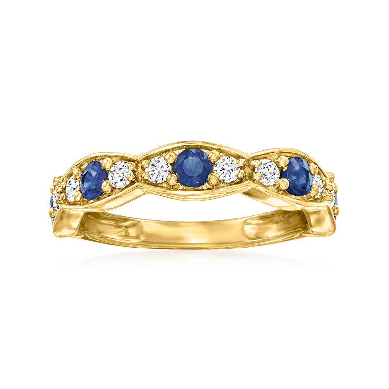 14kt yellow gold ring with oval blue sapphire and round diamond accents
