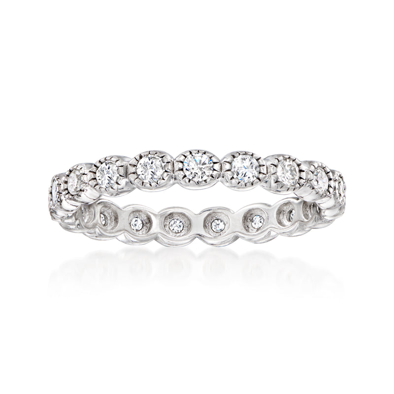 Sterling silver diamond eternity band with milgrain edges and round bezel-set stones