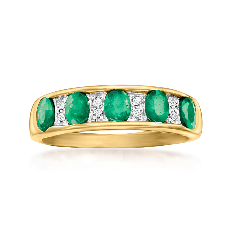 14kt yellow gold emerald and diamond band ring with five green emeralds