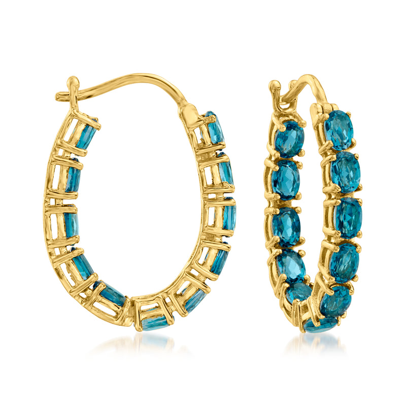 Gold hoop earrings with inside-out London blue topaz accents and hinged posts