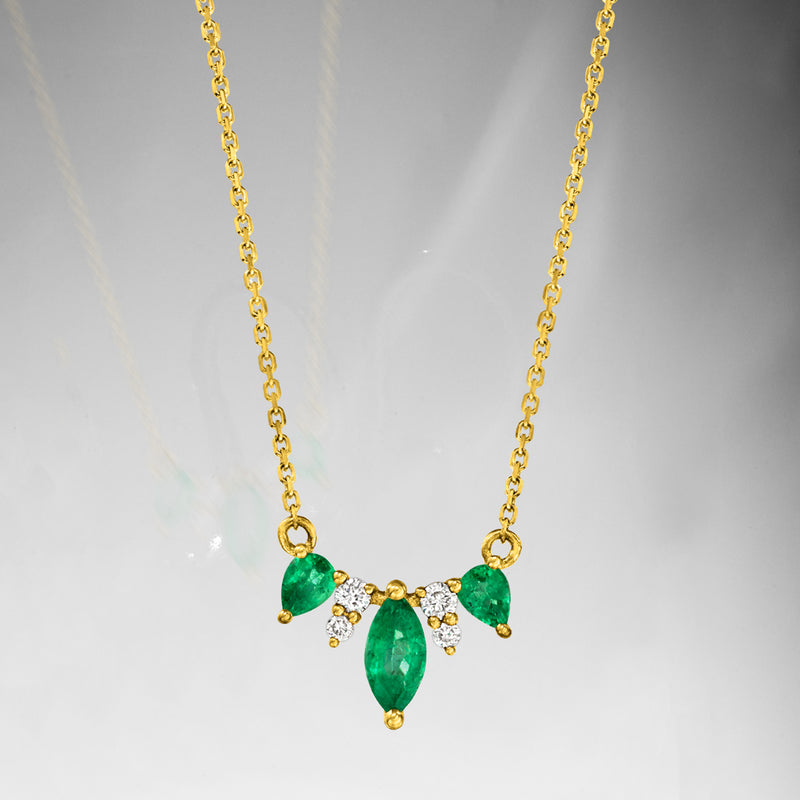 14kt yellow gold necklace with three emerald pear drops and small diamond accents