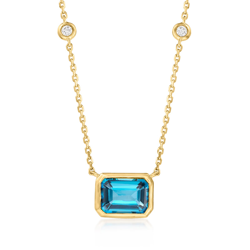 14kt yellow gold necklace with blue topaz pendant and diamond accents