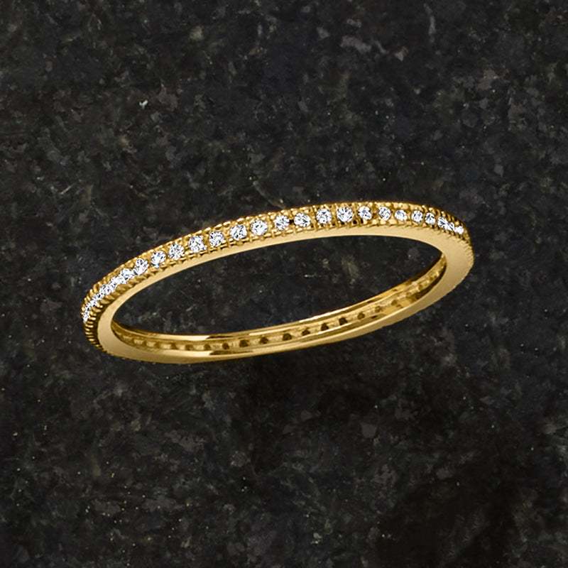 14kt yellow gold diamond eternity band side profile with continuous row of round stones