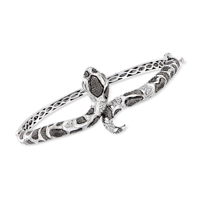 Sterling silver snake bangle bracelet with diamond-like accents and detailed coiled design